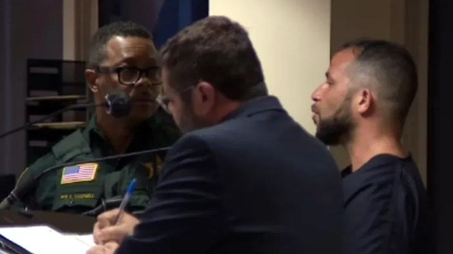 Junior Boucher, right, during a court appearance. (WPEC)