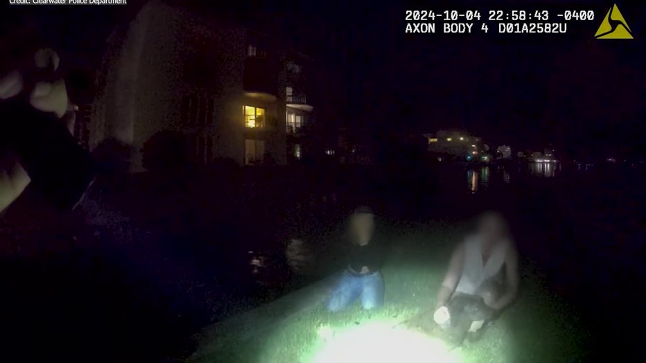 The police officer found the dog in a canal and said it was at risk of being swept away into the Gulf of Mexico.