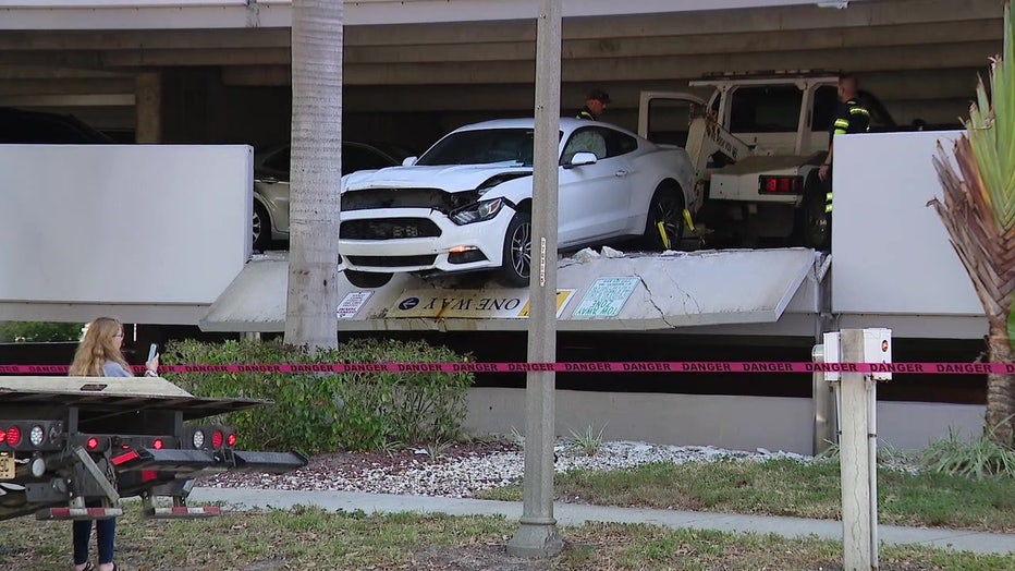 A man drove through a second-story barrier in a St. Pete parking garage on Thursday morning.