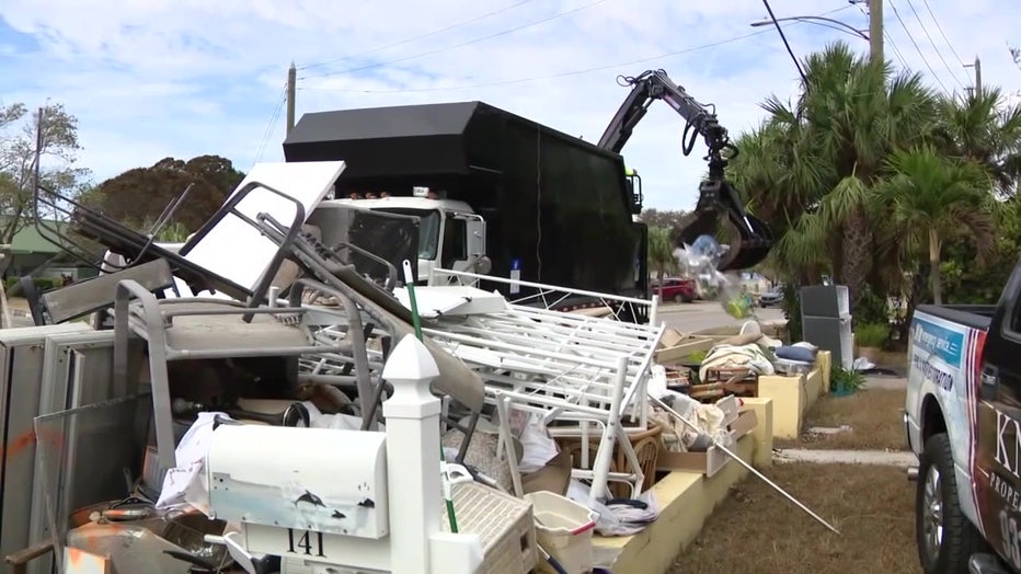 Debris being unloaded by debris cleanup teams in Pinellas County