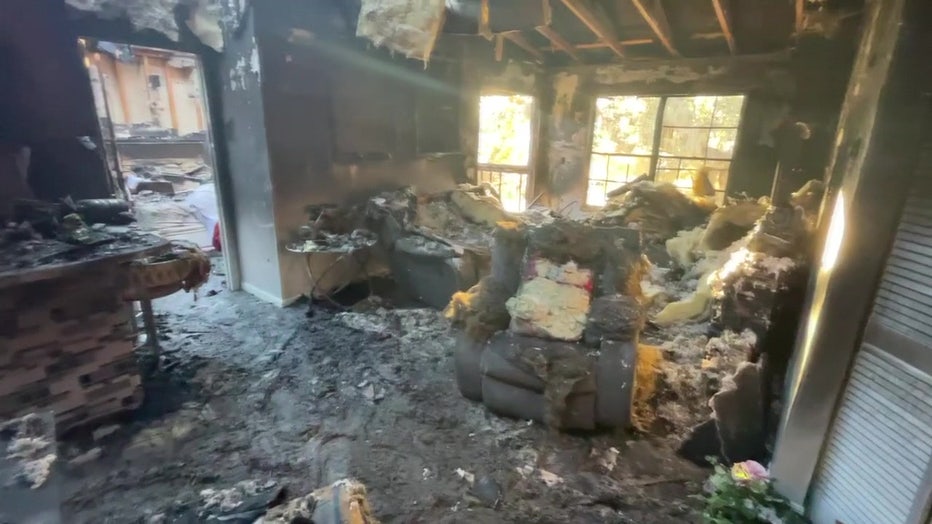 Charred wood and ash are all that is left of Lester Garcia's apartment.