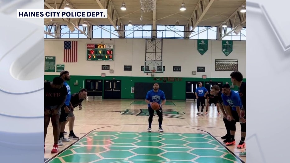 Polk County first responders participating in the basketball fundraiser for the Popoca family.