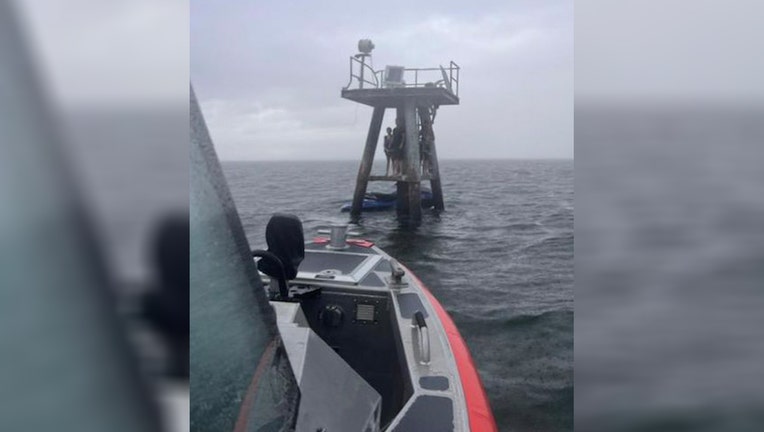 The U.S. Coast Guard rescued a father and her three kids who were stranded near the Sunshine Skyway Bridge. (Courtesy: USCG)