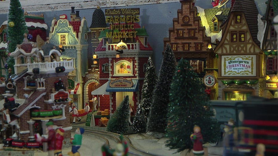 Scenes from a 1920-1940s village help make up the Christmas Village.