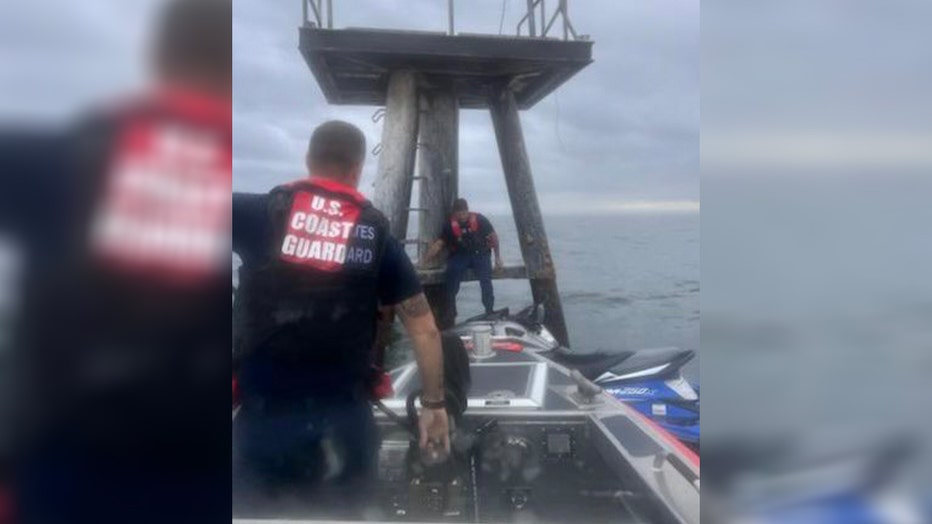 The U.S. Coast Guard rescued a father and her three kids who were stranded near the Sunshine Skyway Bridge. (Courtesy: USCG)