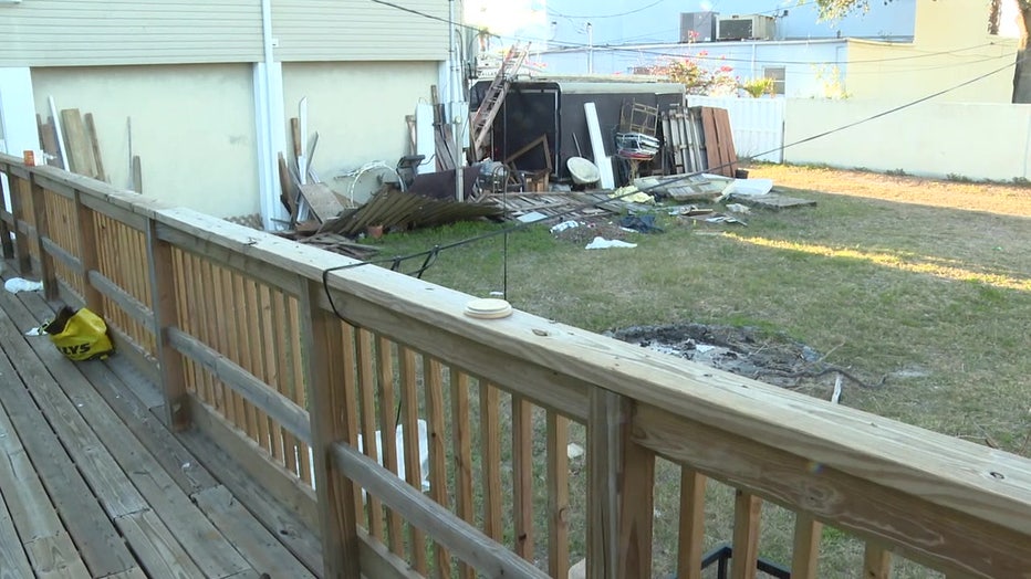 One of Robinson Ang's tenants was staying in a tent on the property in the fenced-in backyard, but Ang says the city threatened a fine, so she had to leave Sunday.