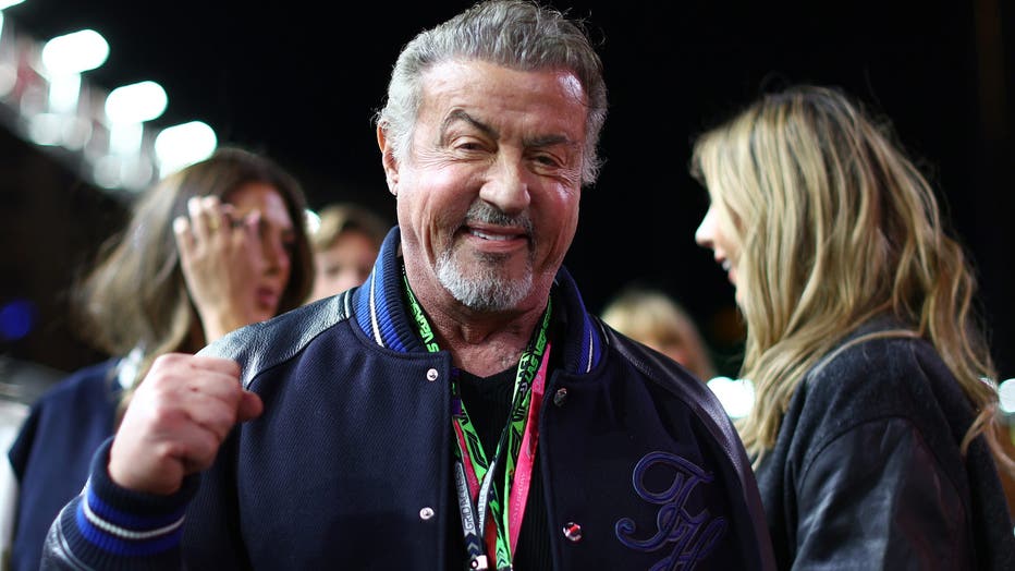 LAS VEGAS, NEVADA - NOVEMBER 23: Sylvester Stallone poses for a photo on the grid prior to the F1 Grand Prix of Las Vegas at Las Vegas Strip Circuit on November 23, 2024 in Las Vegas, Nevada. (Photo by Clive Rose - Formula 1/Formula 1 via Getty Images)