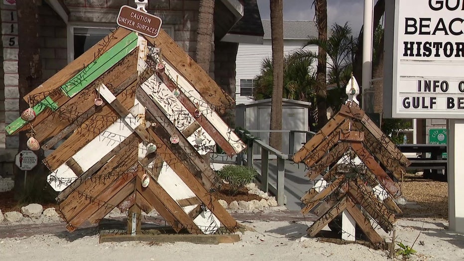 Three trees made from hurricane debris sit outside the Gulf Beaches Historical Museum in Pass-a-Grille.