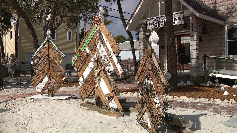 Three trees made from hurricane debris sit outside the Gulf Beaches Historical Museum in Pass-a-Grille.