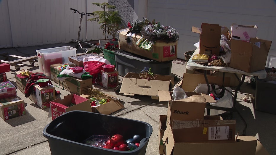 Christmas package items being staged before being passed out to Apollo Beach residents displaced by hurricanes.