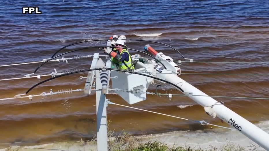 FPL power lines among hurricane damage on the road.