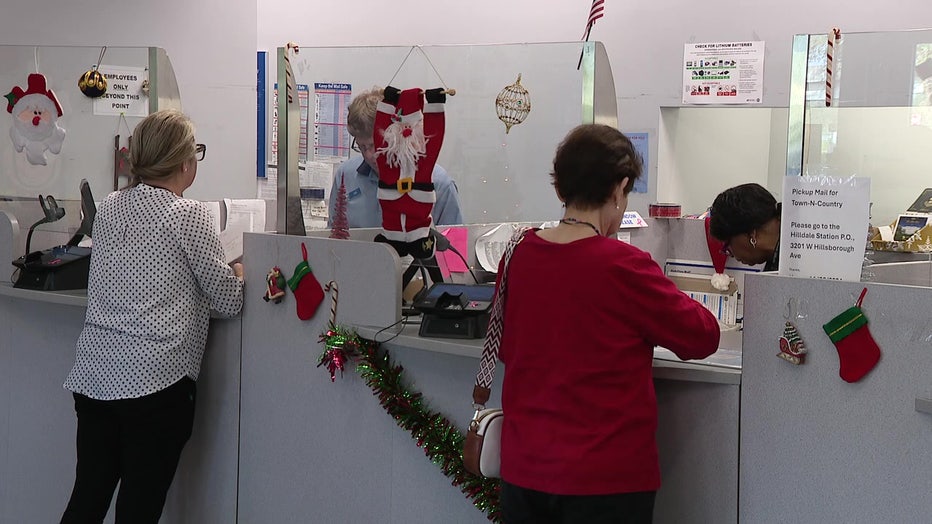 People mailing packages.