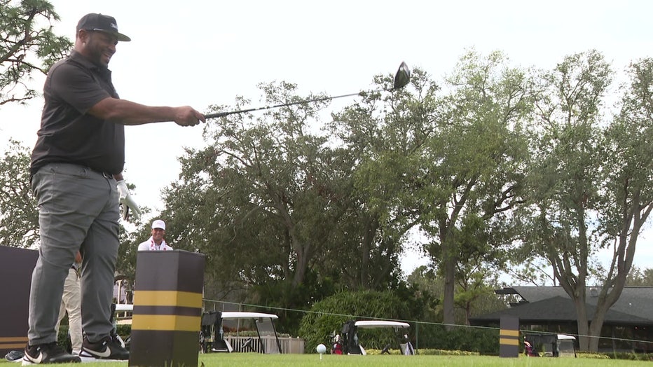 Jerome Bettis tees off during practice round at Copperhead Golf Course.