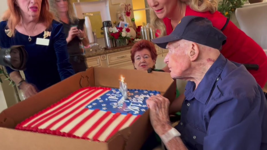 Bill Monfort blew out candles on his birthday cake on his 108th birthday.