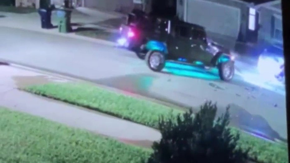 Winter Haven police are searching for the driver of a Jeep seen on camera slamming into a parked car and taking off. Image is courtesy of the Winter Haven Police Department.