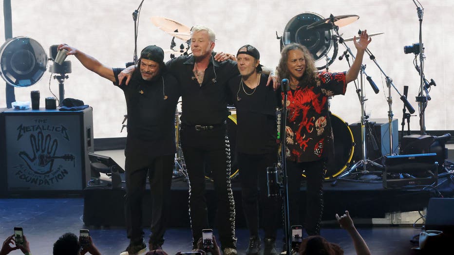 INGLEWOOD, CALIFORNIA - DECEMBER 13: (L-R) Robert Trujillo, James Hetfield, Lars Ulrich and Kirk Hammett of Metallica pose onstage during Metallica's All Within My Hands Foundation Presented by the Helping Hands Concert And Auction 2024 at YouTube Theater on December 13, 2024 in Inglewood, California. (Photo by Kevin Winter/Getty Images)