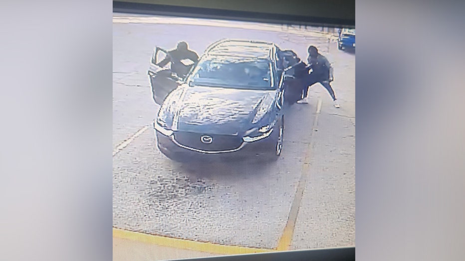 After running from the store, deputies said the two suspects got into a dark-colored Mazda. Image is courtesy of the Pasco County Sheriff's Office.