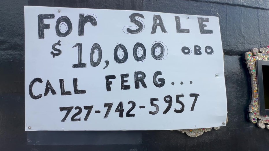 'For sale' sign on the side of the pirate outside Ferg's bar and grill.