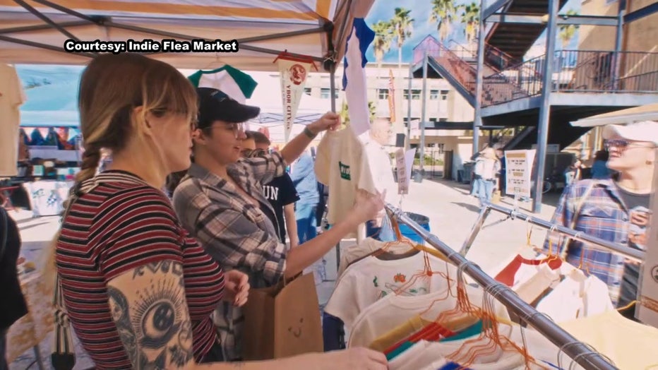 People shop for boutique clothing at Indie Flea Market.