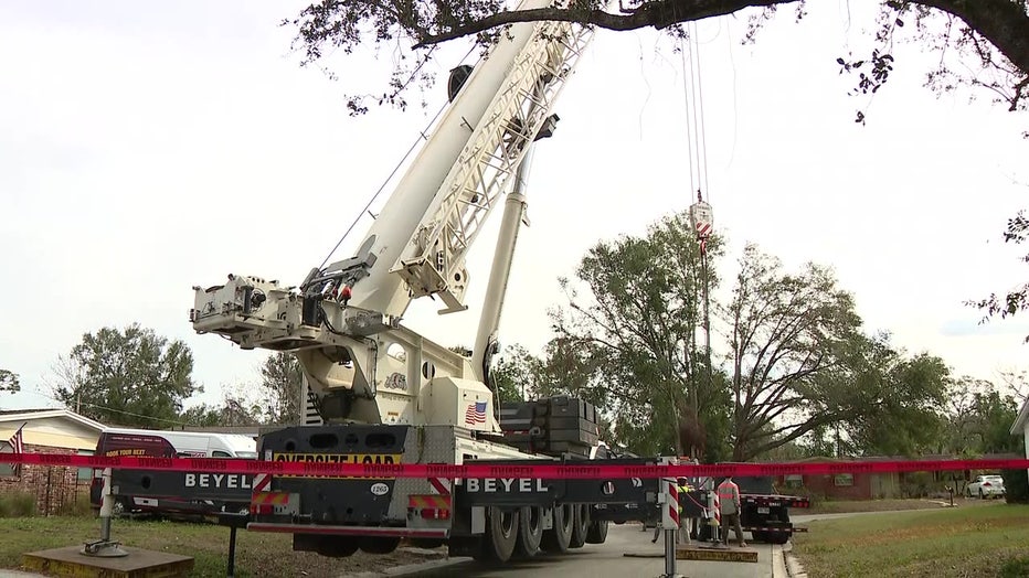 Beyel Brothers used a crane to remove the tree for free on Monday.