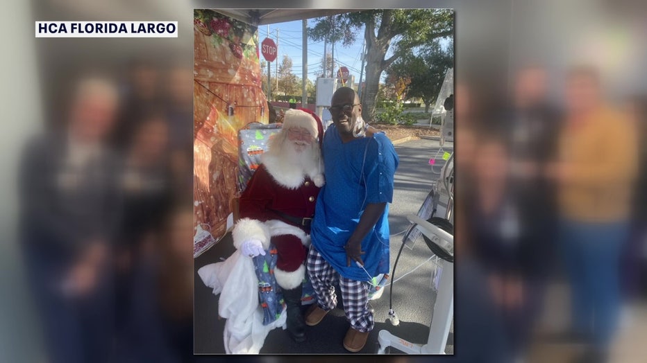 Phillip Allen sitting on Santa's lap.