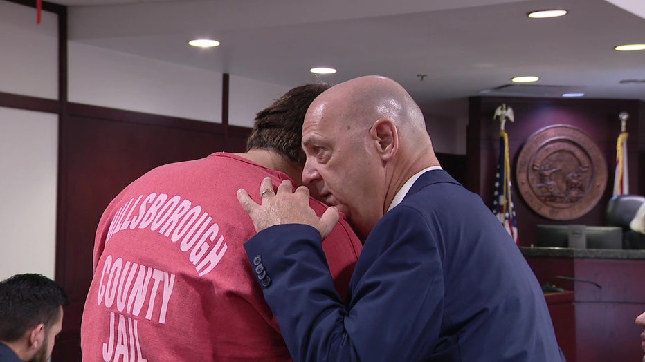 Logan Williams speaking to his attorney in a Hillsborough County courtroom on Wednesday.
