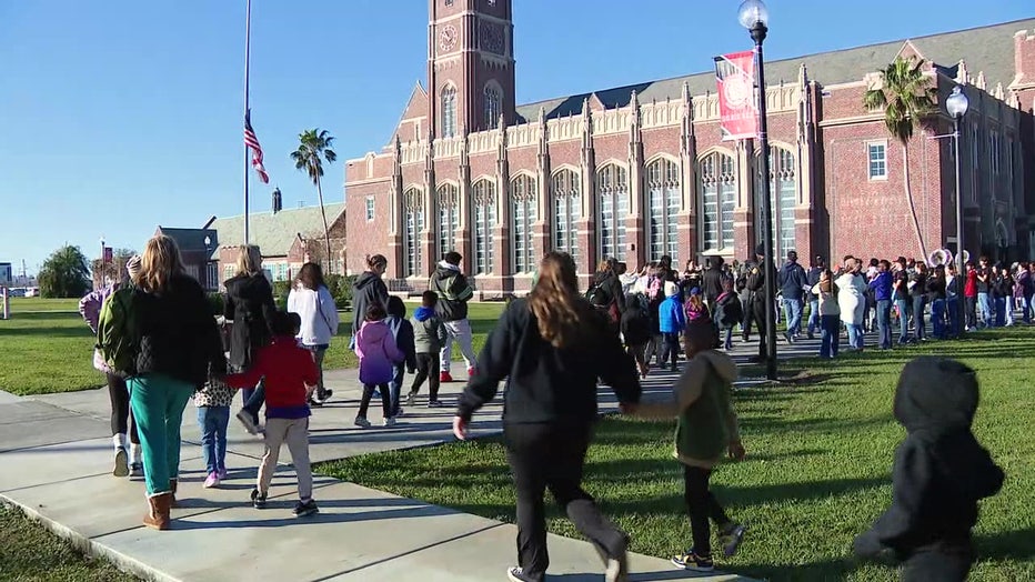 More than 350 Seminole Heights Elementary School students walked 12 blocks to Hillsborough High School on Friday.