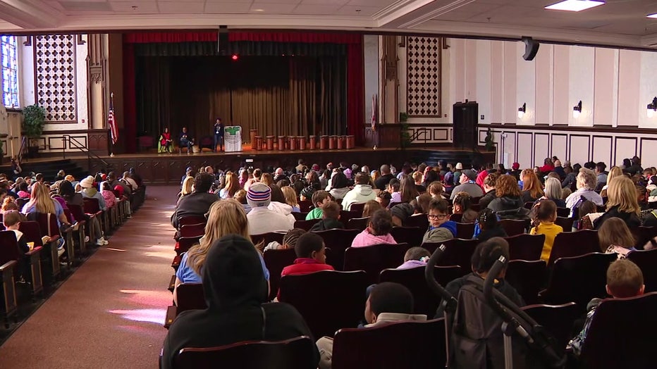 Students heard from motivational speakers and got awards after walking to Hillsborough High School.