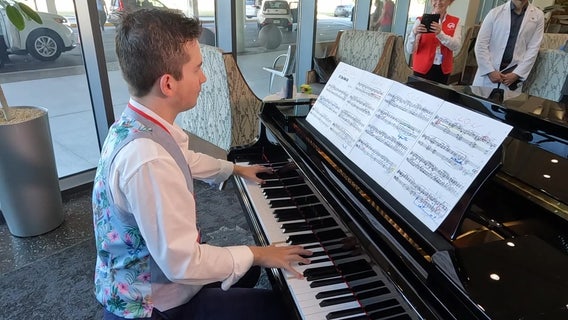 Extraordinary young pianist inspiring people at Moffitt Cancer Center