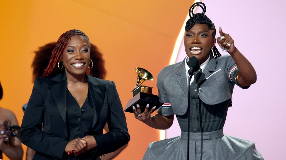 LOS ANGELES, CALIFORNIA - FEBRUARY 02: Doechii (R) accepts the Best Rap Album award for