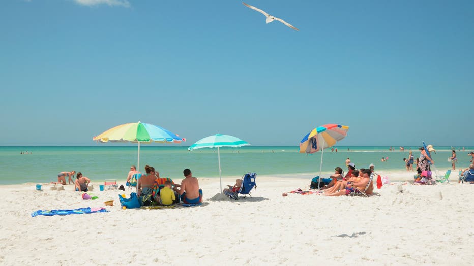 Beach goers and sun worshipers enjoy the sand and the water of Siesta Key Beach in Sarasota, Florida. Siesta Key has been name to top beach in the U.S. (Photo by: Education Images/Universal Images Group via Getty Images)