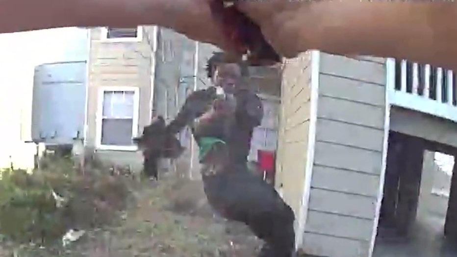 Bodycam video shows an exchange of gunfire between a suspect and officers on Tuesday. (Courtesy: Tampa Police Dept.)