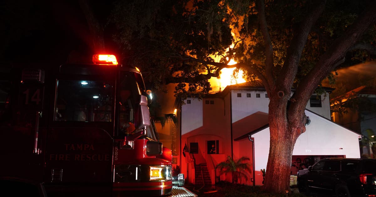 Crews battle large fire at 2-story home in Tampa | FOX 13 Tampa Bay
