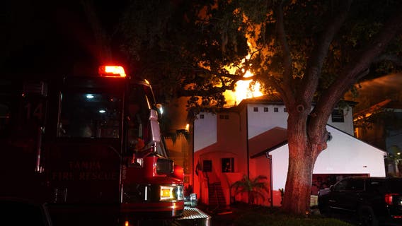 Crews battle large fire at 2-story home in Tampa