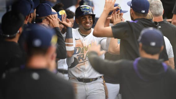Doyle and Farmer help the Rockies beat the Rays 2-1