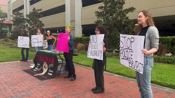 Protesters renew calls for firing Lakeland detective accused of brutalizing woman during traffic stop
