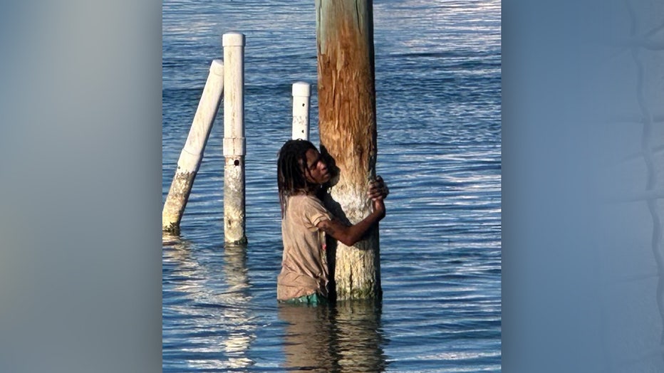 Da’Veon Hassan Fleming clings to a pylon in Islamorada while trying to escape deputies. Image is courtesy of the Monroe County Sheriff's Office.