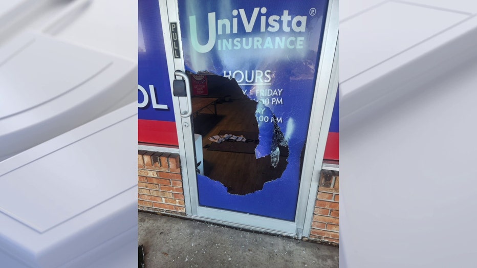 Exterior view of the Univista Insurance building with broken window