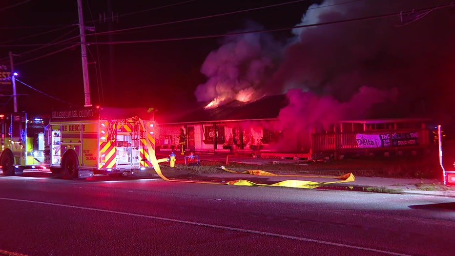 Crews battled a fire at a smoke shop in Town 'n' Country early Tuesday.