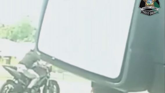 VIDEO: Deputy hit, dragged by motorcyclist during traffic stop, PCSO looking for driver