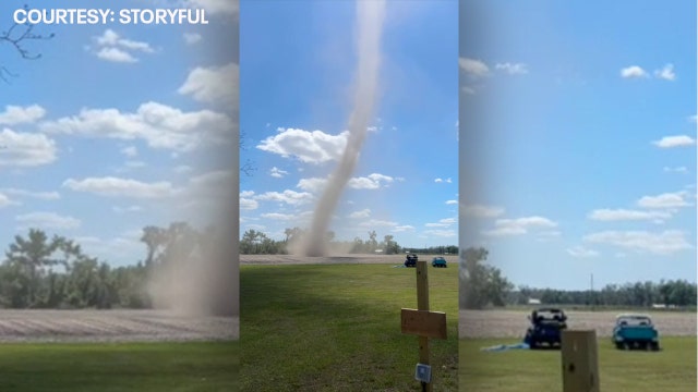 'Hundreds of feet tall': Large dust devil swirls close to Florida homes