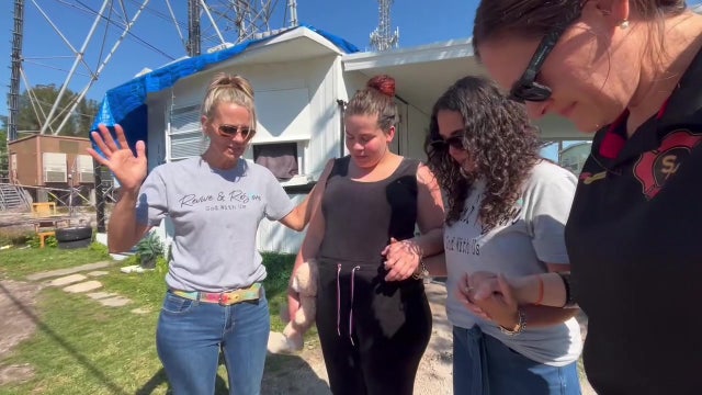 Volunteers help mother move into new home after hurricanes