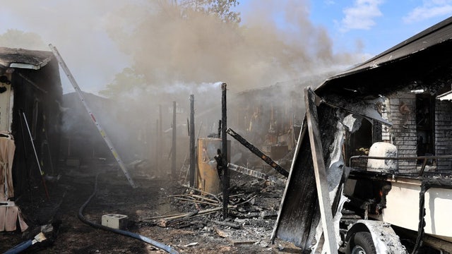 Tampa house fire that sparked blaze next door is under investigation: HCFR