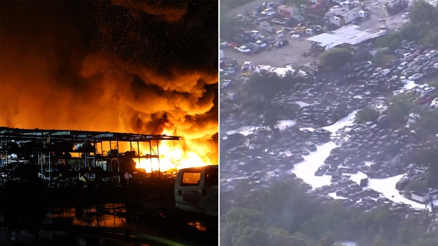 Crews battle large fire at Hillsborough County auto salvage yard