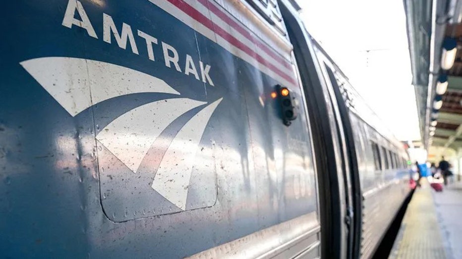 The Amtrak logo on a train at Union Station in Washington, D.C., on April 22, 2022. (Photo by Stefani Reynolds/AFP via Getty Images)