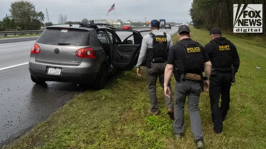 A Task Force comprised of local and federal law enforcement agencies searched a suspected illegal migrant's vehicle in St. Johns County, Florida on Monday, Feb. 24, 2025, following a traffic stop. (Stephanie Keith for Fox News Digital)