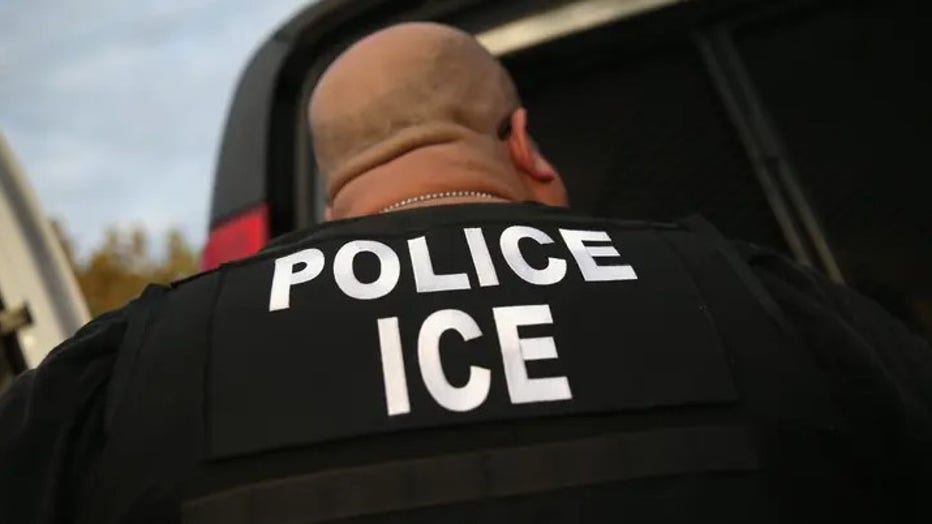 Battle is facing charges of kidnapping in the commission of a felony, robbery by sudden snatching, impersonating a law enforcement officer in the commission of a felony and felony violation of probation. (John Moore/Getty Images)