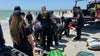 Person hospitalized after being pulled from water on Treasure Island Beach