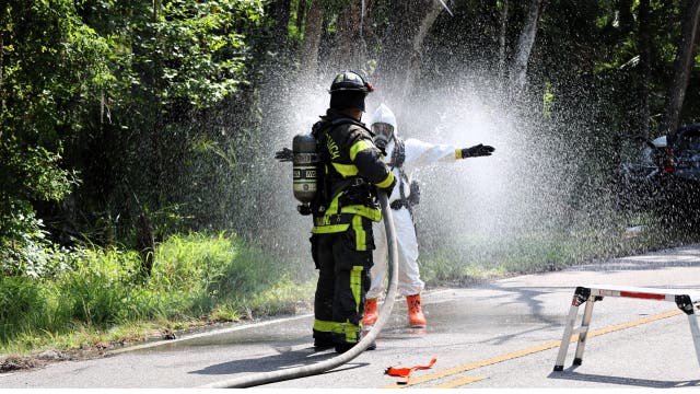 Crash spills pool chemicals across a Lithia road, critically injuring 1 and creating HAZMAT situation