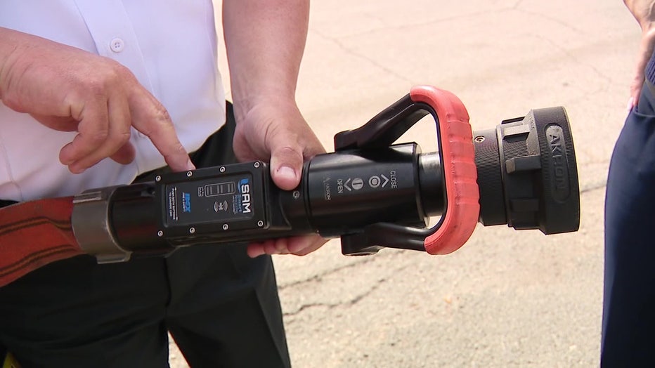 The computerized firetruck system includes a ‘smart’ fire hose that communicates directly with the truck to regulate water pressure in real time,